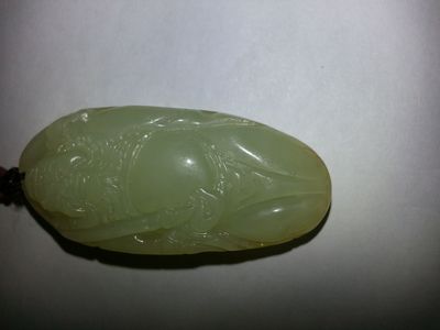 求高手指點(diǎn)這兩塊玉是什么品種,是和田玉還是青海還是韓料還是俄料。我買成3300,朋友說是和田的山料。